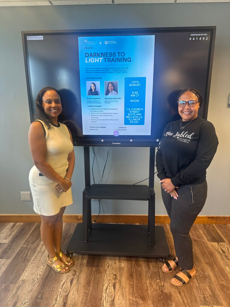 amber and guest presenting in front of a tv