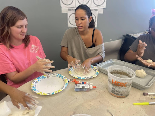 children and youn adults doing crafts